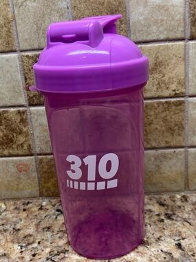 310 Nutrition branded protein shaker bottle in a pinkish purple color.